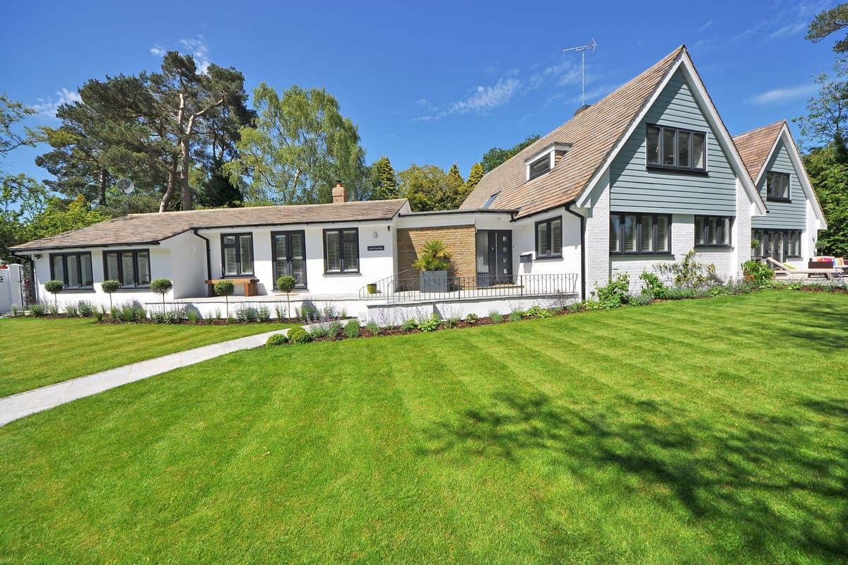 A beautiful home with a manicured front lawn